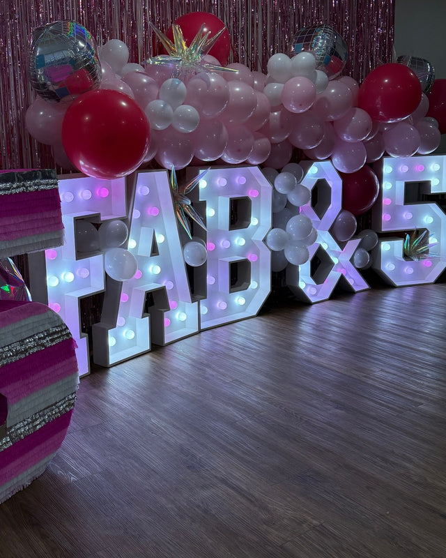 FAB & 5 light-up marquee letter rental setup by Meek Designs in Midland-Odessa, TX