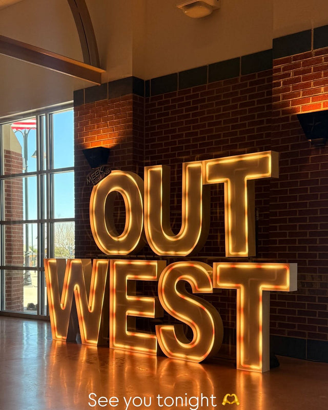 OUT WEST light-up marquee letter rental setup by Meek Designs in Midland-Odessa, TX